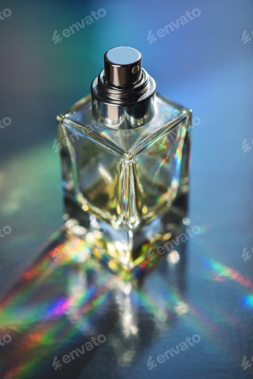 Preview: Close-Up of Glass Perfume Bottle with Rainbow Reflections