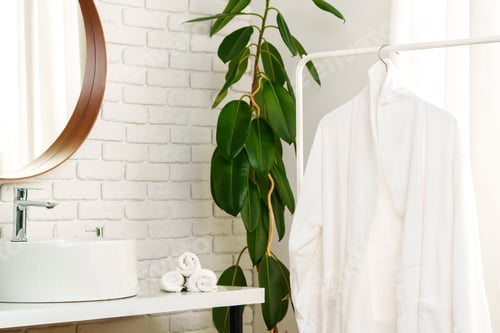 Preview: Mirror and towels in the bathroom close up