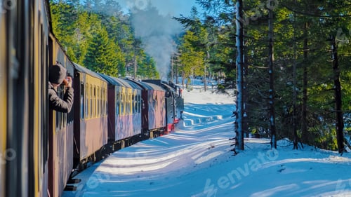 Preview: Steam train during winter in the snow in the Harz Germany Brocken Bahn