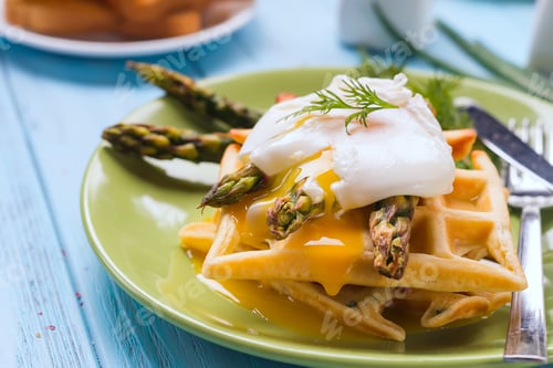 Preview: Grilled waffle with Green boiled Asparagus with Poached Egg, with salt and spices on ceramic plate