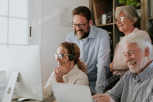Preview: Video conference. Group of old and middle age business people working and using computer