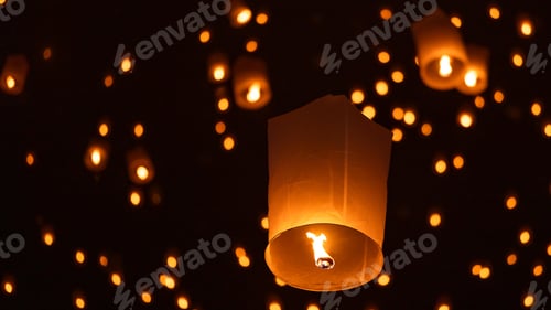 Preview: Sky lantern floating in the dark night sky, Tourist floating sky lanterns, Sky lanterns