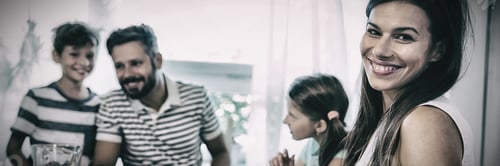 Preview: Family Smiles Together Inside Home During Daytime