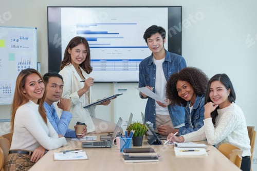 Preview: Group of Asian business people meeting to discuss and plan investment business and market analysis