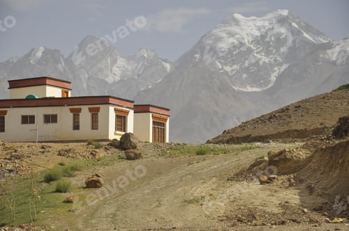 Preview: Beautiful view of a Ladakhi house with glacier view in the background in Padum, Zanskar Valley, Lada