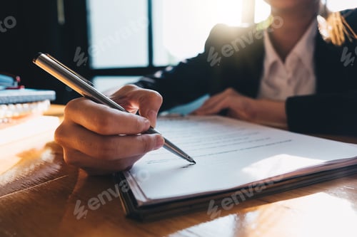 Preview: Close up business man signing contract making a deal with business partner