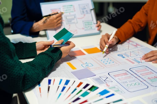 Preview: UX developer and ui designer brainstorming about mobile app interface wireframe design
