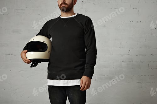 Preview: Young man with motorcycle helmet