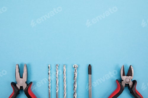 Preview: Set of different tools on blue background