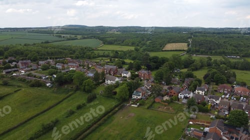 Preview: Aerial view of village and green fields