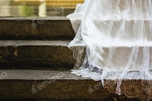 Preview: Detail of the fabric of a white wedding dress.