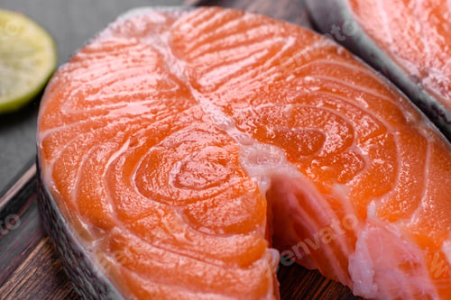 Preview: Fresh raw salmon steak with spices and herbs prepared for grilled baking