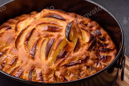 Preview: Baked sweet apple pie in a baking dish