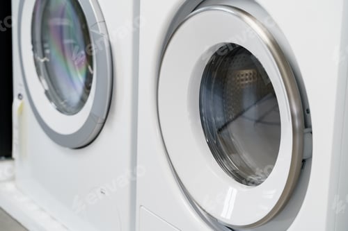 Preview: Close up of new dryer machine in household appliances store