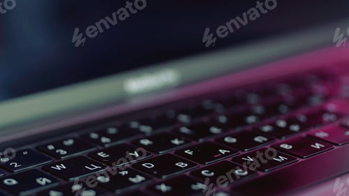 Preview: Silver laptop with black keybord details. Action. Close up of a new modern laptop, concept of