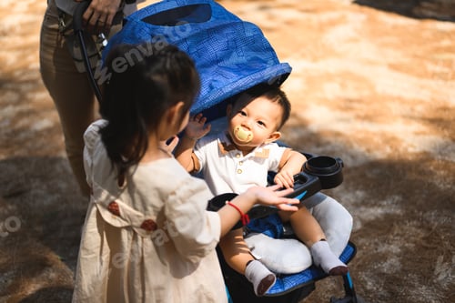 Preview: Happy kids daughter and son travel with family on summer weekend