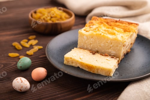 Preview: Сottage cheese Сasserole, Curd cake, with dried apricots and raisins on brown wooden