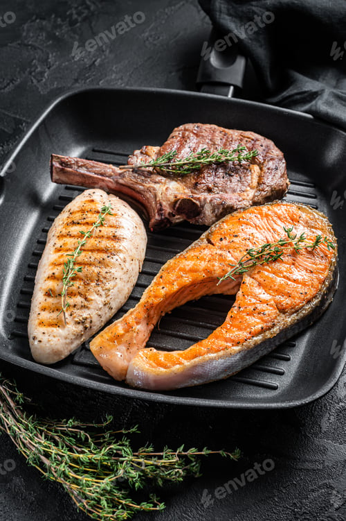 Preview: Grilled steaks. Beef rib eye, salmon and Turkey breast. Organic fish, poultry and beef meat.