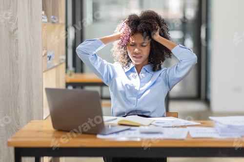 Preview: Portrait of tired young business african american woman work with documents tax laptop computer
