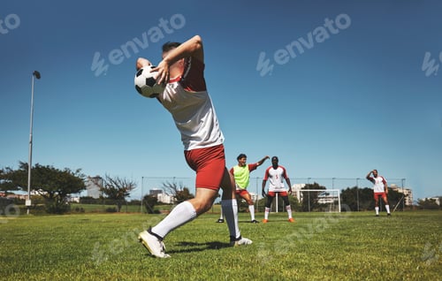 Preview: Football throw, soccer and field game of a team in a fitness, exercise and sports match outdoor. Tr