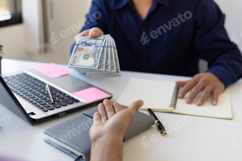 Preview: Business Handing Over Money in the Workplace