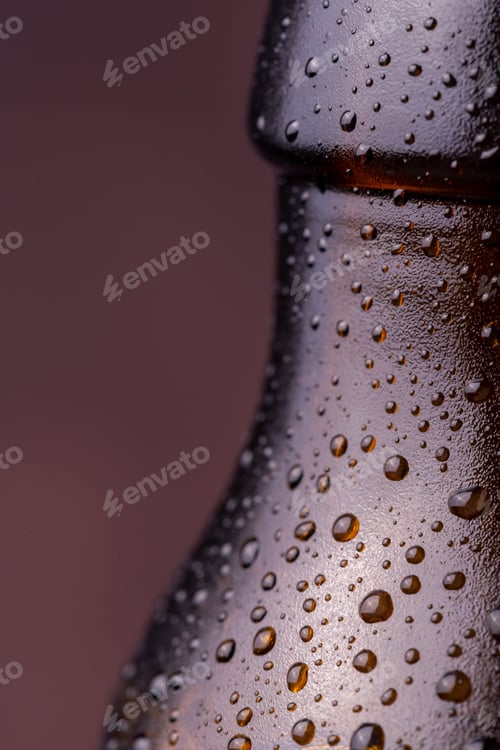 Preview: Bottle of cold beer with drops of water