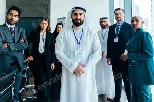 Preview: Multiethnic business team participating in corporate meeting in dubai office