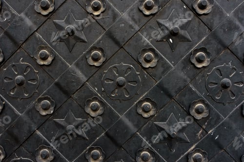 Preview: Black forged door, rhombus symmetrical texture. Grunge black background
