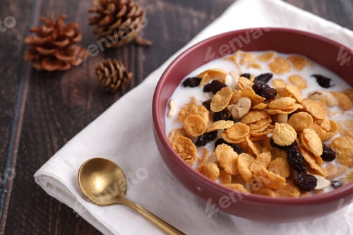 Preview: Cereal Dessert With Corn Oat And Dry Fruits Isolated In Wood Background