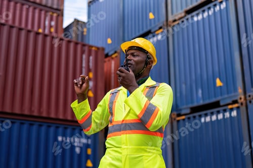 Preview: Worker in container storage yard check quantity radio walkie talkie to team prepare to delivery