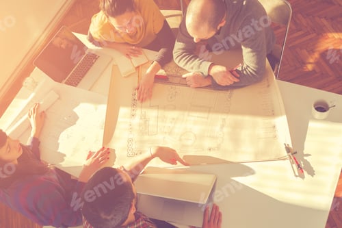 Preview: Young Group Of People/Architects Discussing Business Plans.