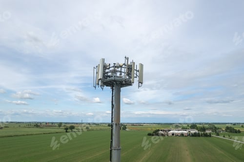 Preview: broadcast mobile 4g lte 5g antenna in a rural field in countryside