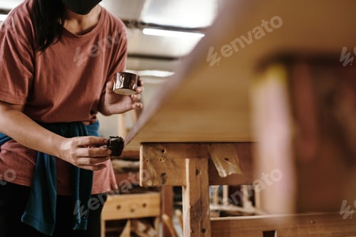 Preview: Carpenter Applying Protective Finish