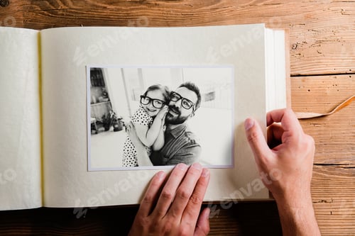 Preview: Fathers day concept. Photo album, black-and-white pictures.