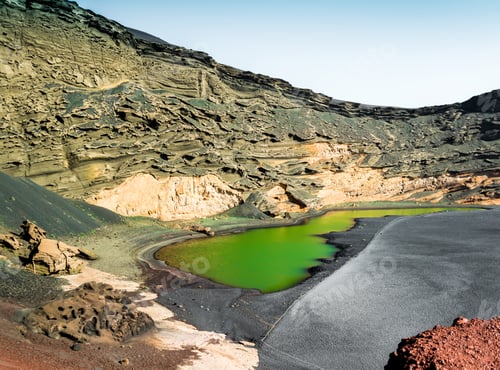 Preview: beautiful green lake Lago Verde inside crater on Lanzarote