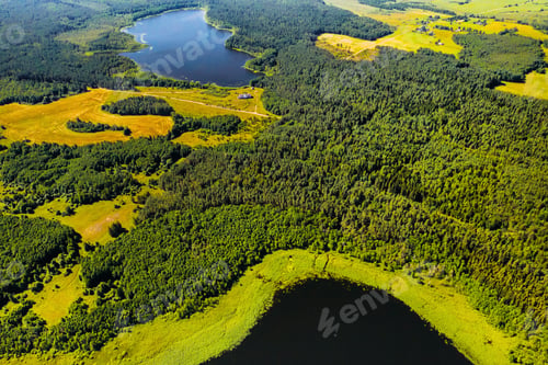 Preview: Top view of Bolta lake in the forest in the Braslav lakes National Park at dawn, the most beautiful