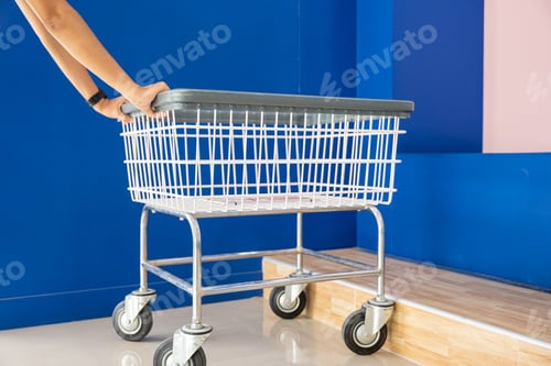 Preview: metal cart parked use for laundry at convenience store for support customer