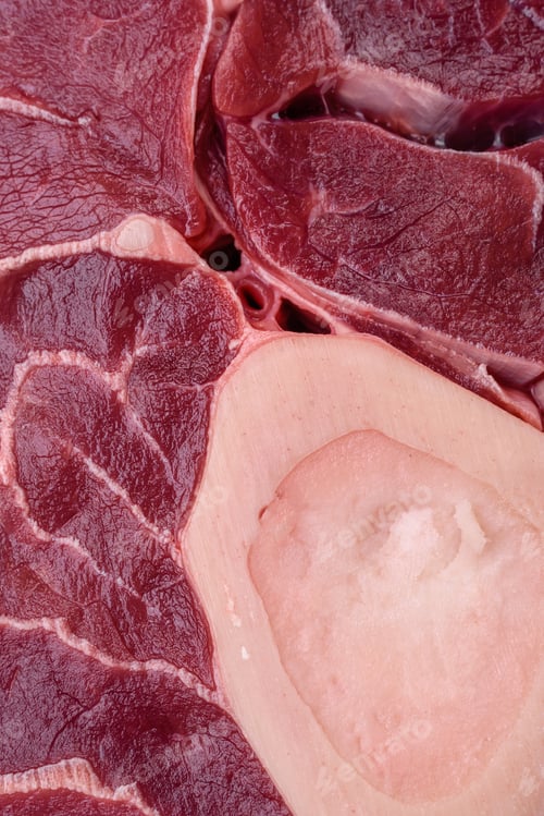 Preview: Fresh raw beef steak with bone or ossobuco with salt, spices and herbs