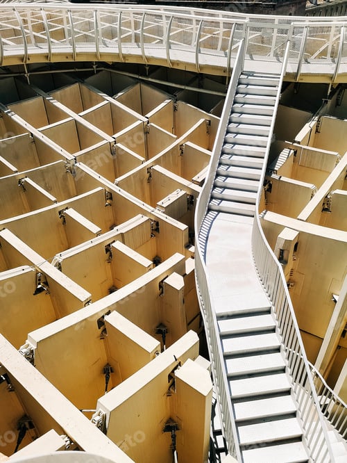 Preview: Vertical high angle shot of a white staircase