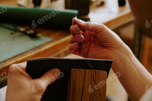 Preview: Male Hands Creating Big Stitches