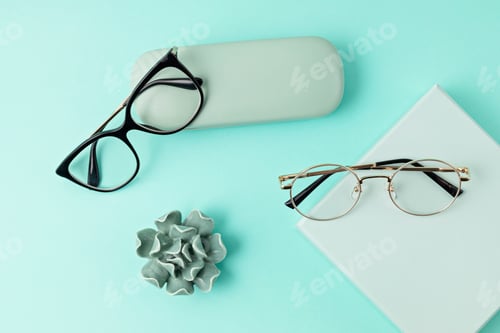 Preview: Stylish eyeglasses over pastel background. Optical store, glasses selection, eye test, vision