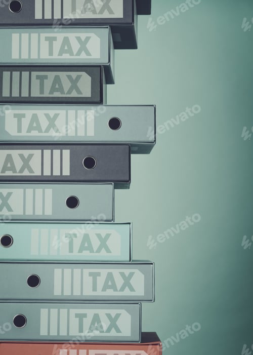 Preview: Pile of ring binders that contain tax documents