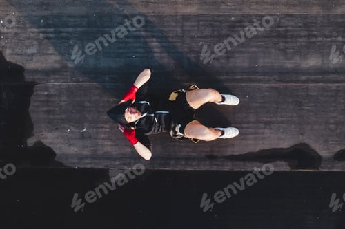 Preview: Boxer doing sit-ups outdoors