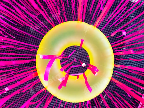 Preview: looking up at yellow swimming ring with vivid pink party ribbon