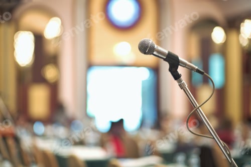Preview: Selective focus on microphone stands on the conference hall for communicating with the lecturer