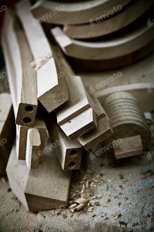 Preview: Chair legs and parts of the chair back on a workbench.