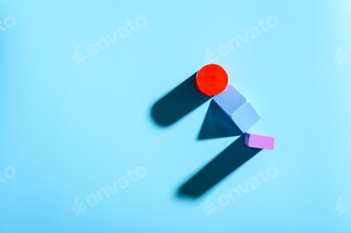 Preview: Blue background with red geometric figures casting shadows in a simple composition.