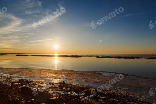 Preview: Beautiful winter sunset by the sea with iceberg