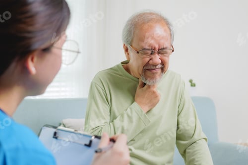 Preview: Senior Man Describing Discomfort to Healthcare Provider
