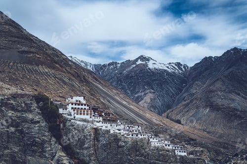 Preview: Ancient Buddhist monastery on cliffs in Ladakh with Himalayan peaks and remote architecture